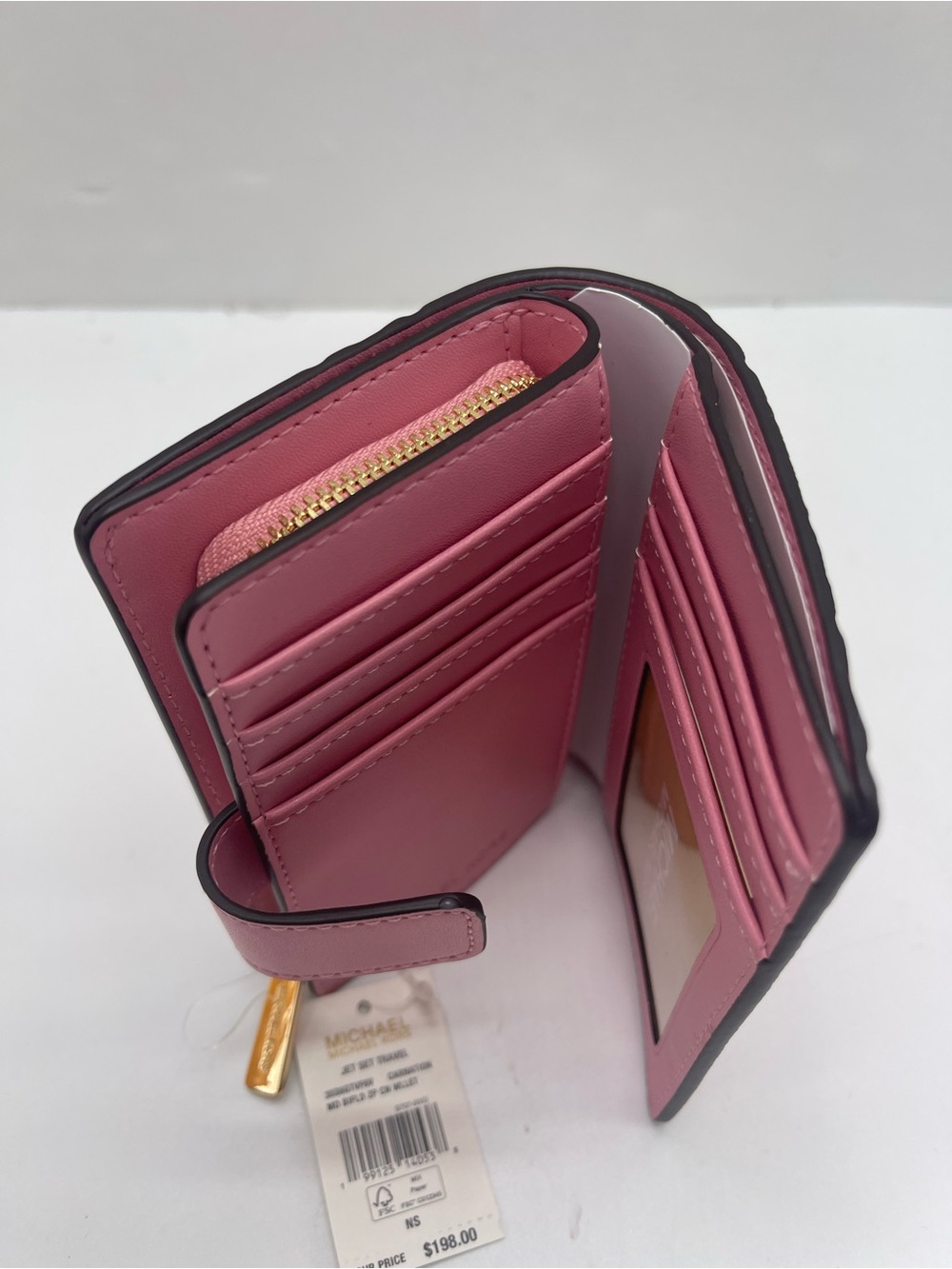 MICHAEL KORS Jet Set Travel Medium MK Logo Debossed Bifold Wallet
Carnation
NWT - Picture 10 of 16